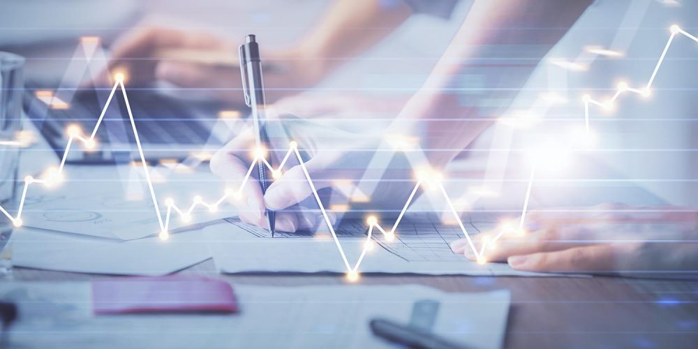 Multi exposure of woman hands typing on computer and financial chart hologram drawing. Stock market analysis concept.